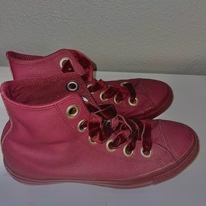 Adorable burgundy leather high top converse with velvet laces, and gold logo.